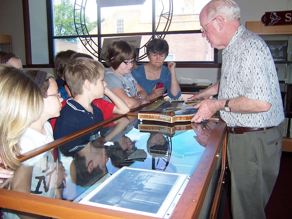 George Bocklage presenting the life and work of Franz Schwarzer, Missouri's famed zither maker.