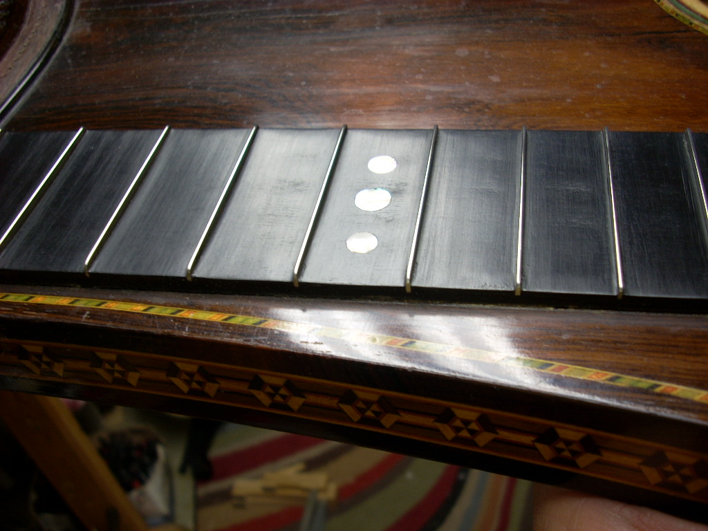 Real ebony fret board