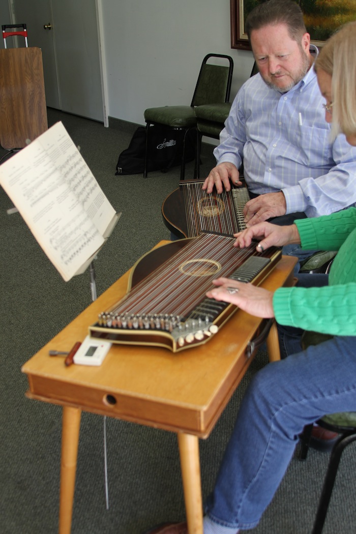 Tom Groeber with new zither student.