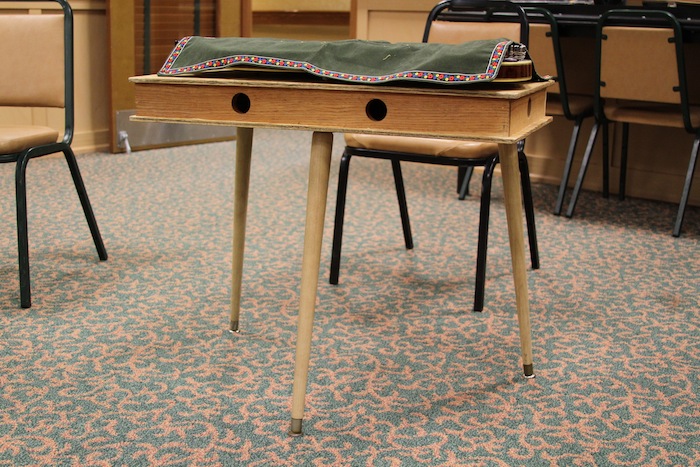 three-legged zither table.